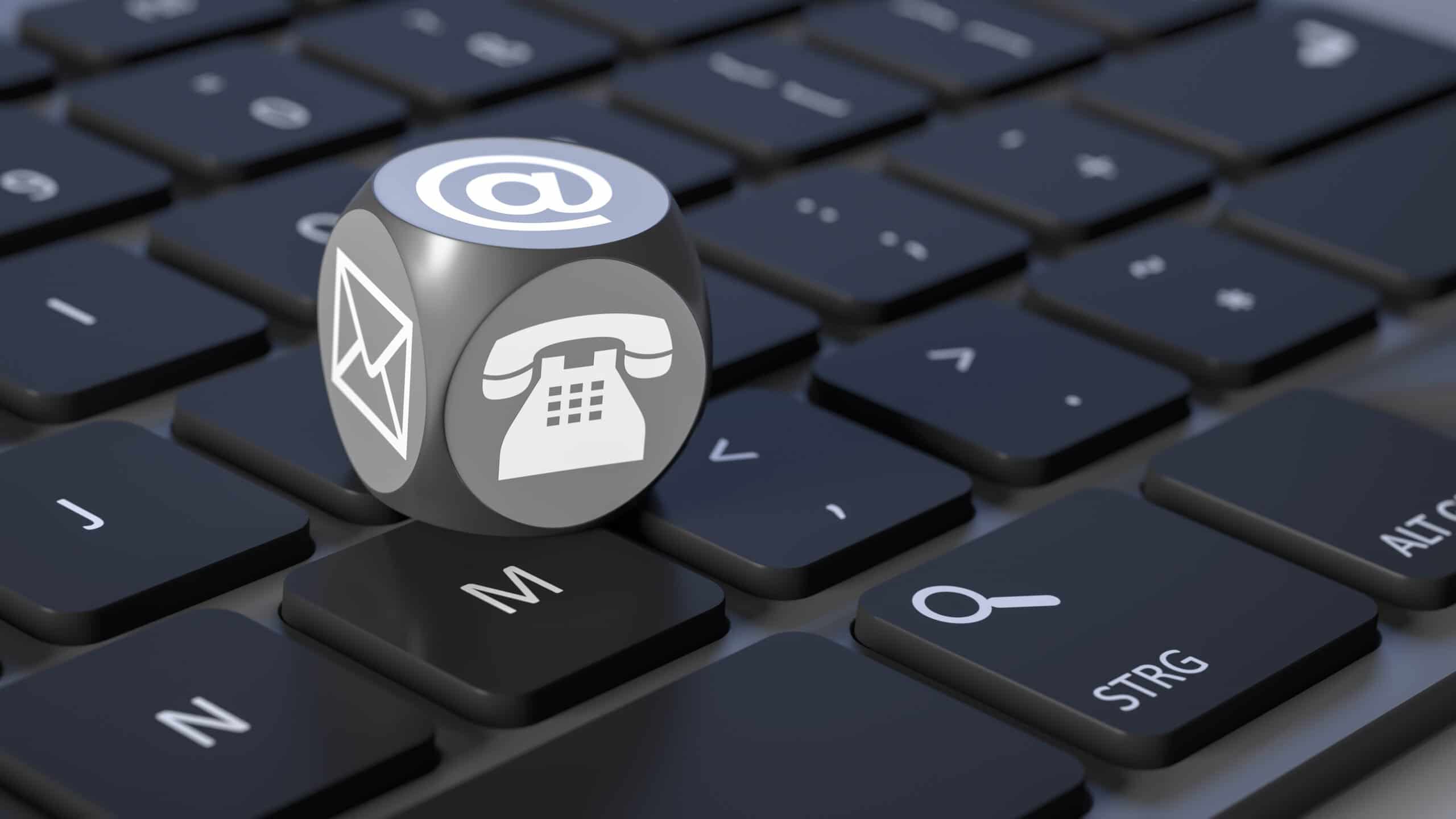 cube with signs for email phone and letter